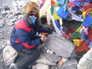 Karin signing the 'rock' at Everest Base Camp!
