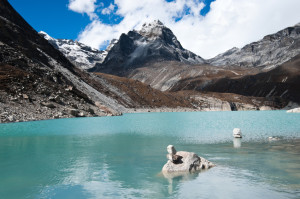 Balance: Pebble stacks and Sacred Lake near Gokyo