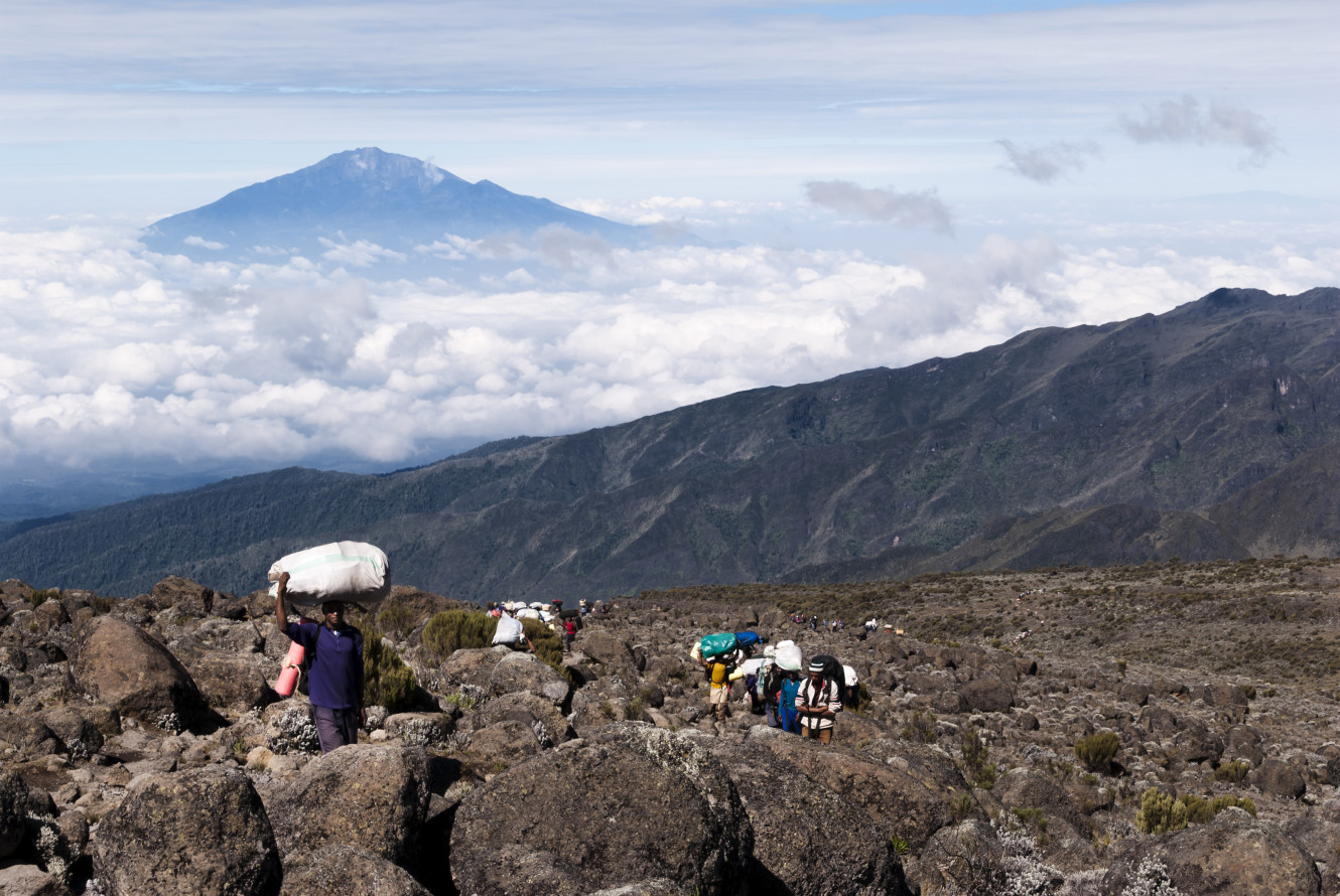 Trail of Porters on Mt Kilimanjaro